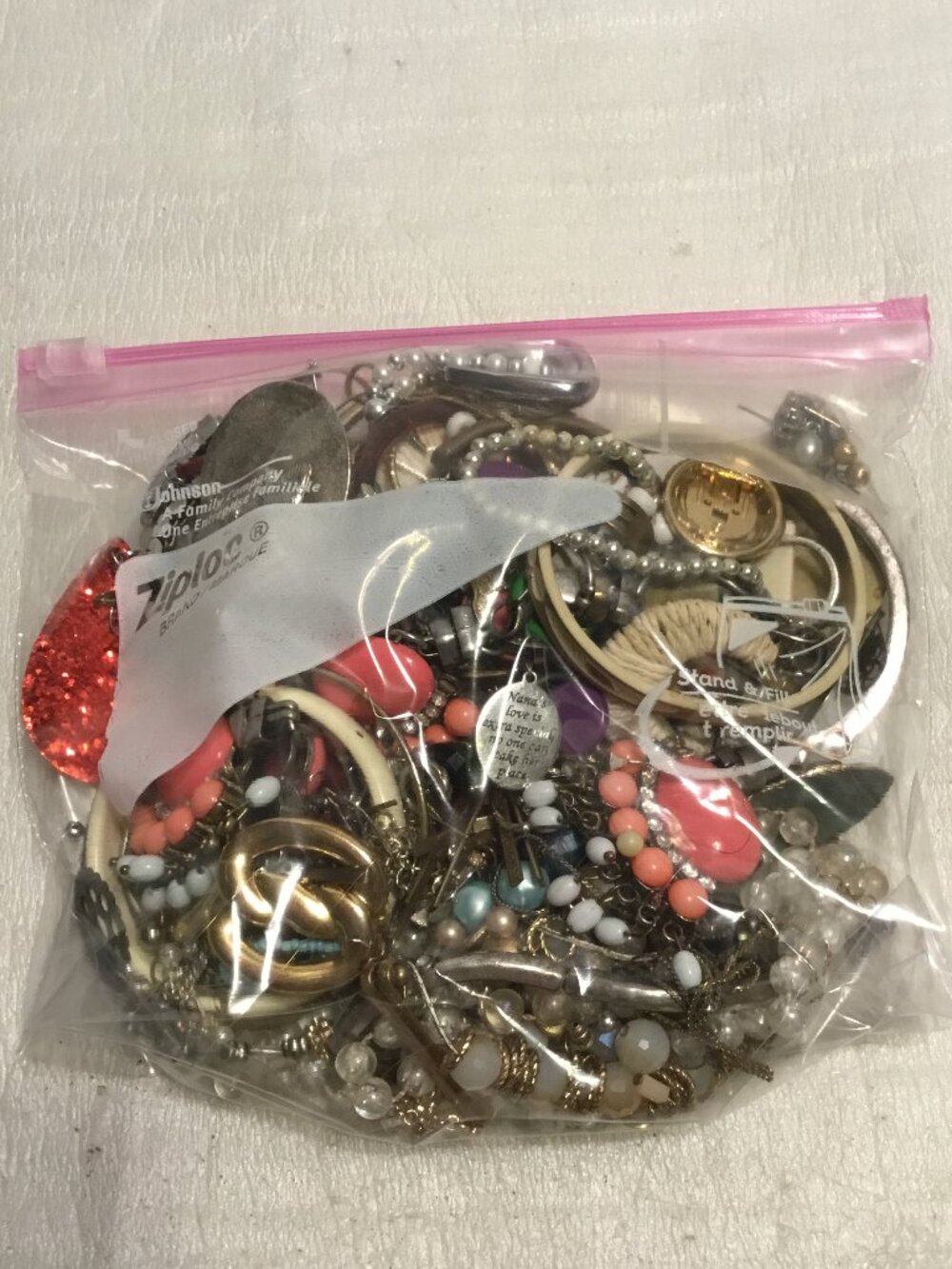 Bag full of old, used, broken and tangled jewelry - some sterling and 14K gold